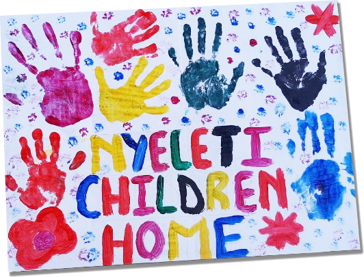 hand painting sign full name of orphanage